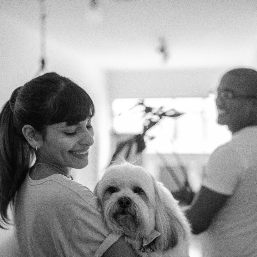 a person holding a dog